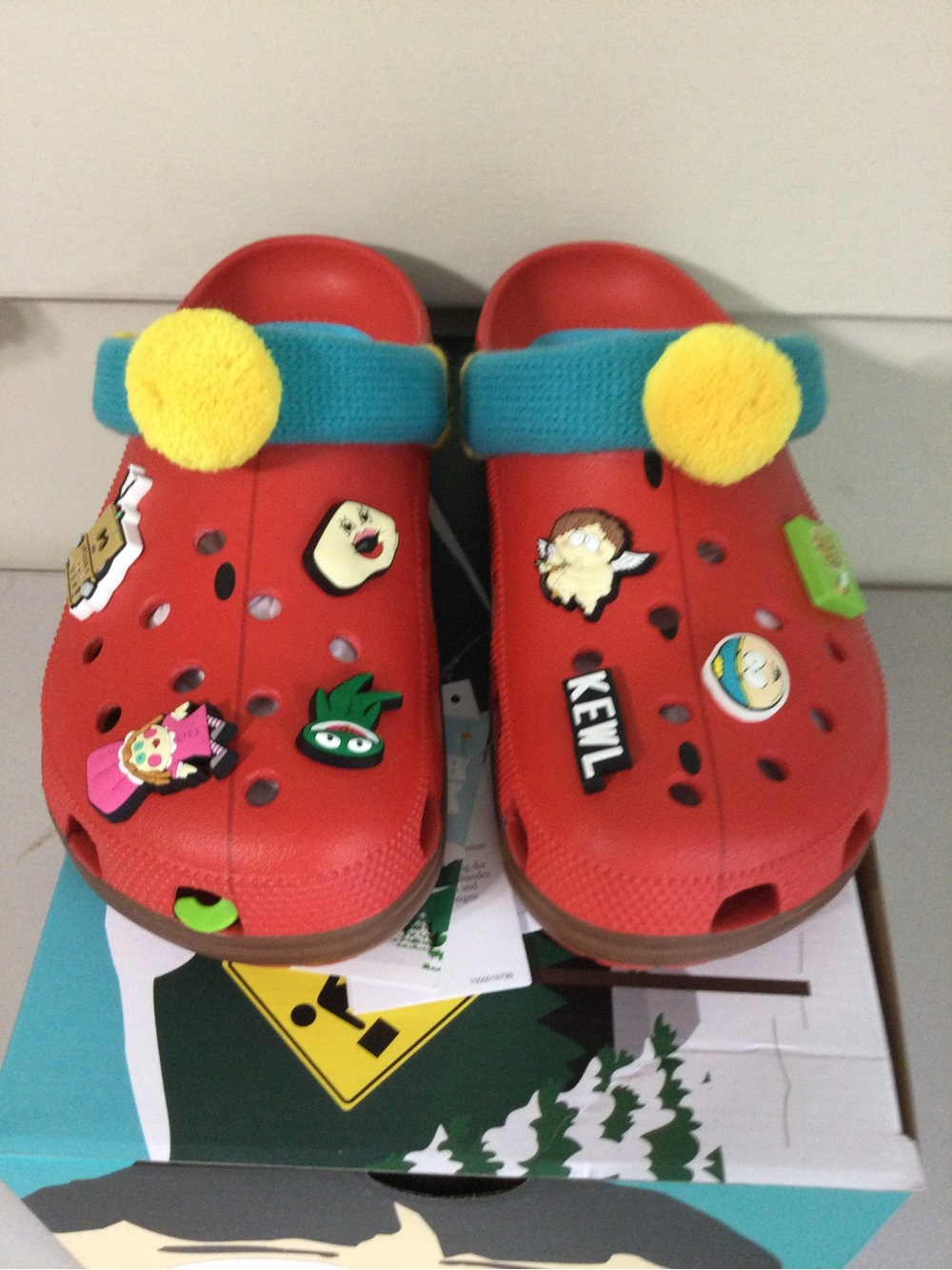 Men Red Slip-On Clogs with Blue Strap and Yellow Pom Accents